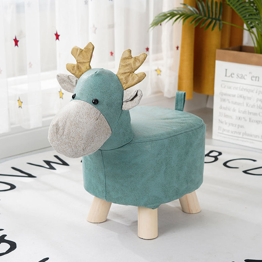 Children's deer-shaped stool with wooden legs in a room setting.