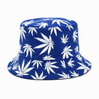 Blue bucket hat with white leaf pattern on a white background