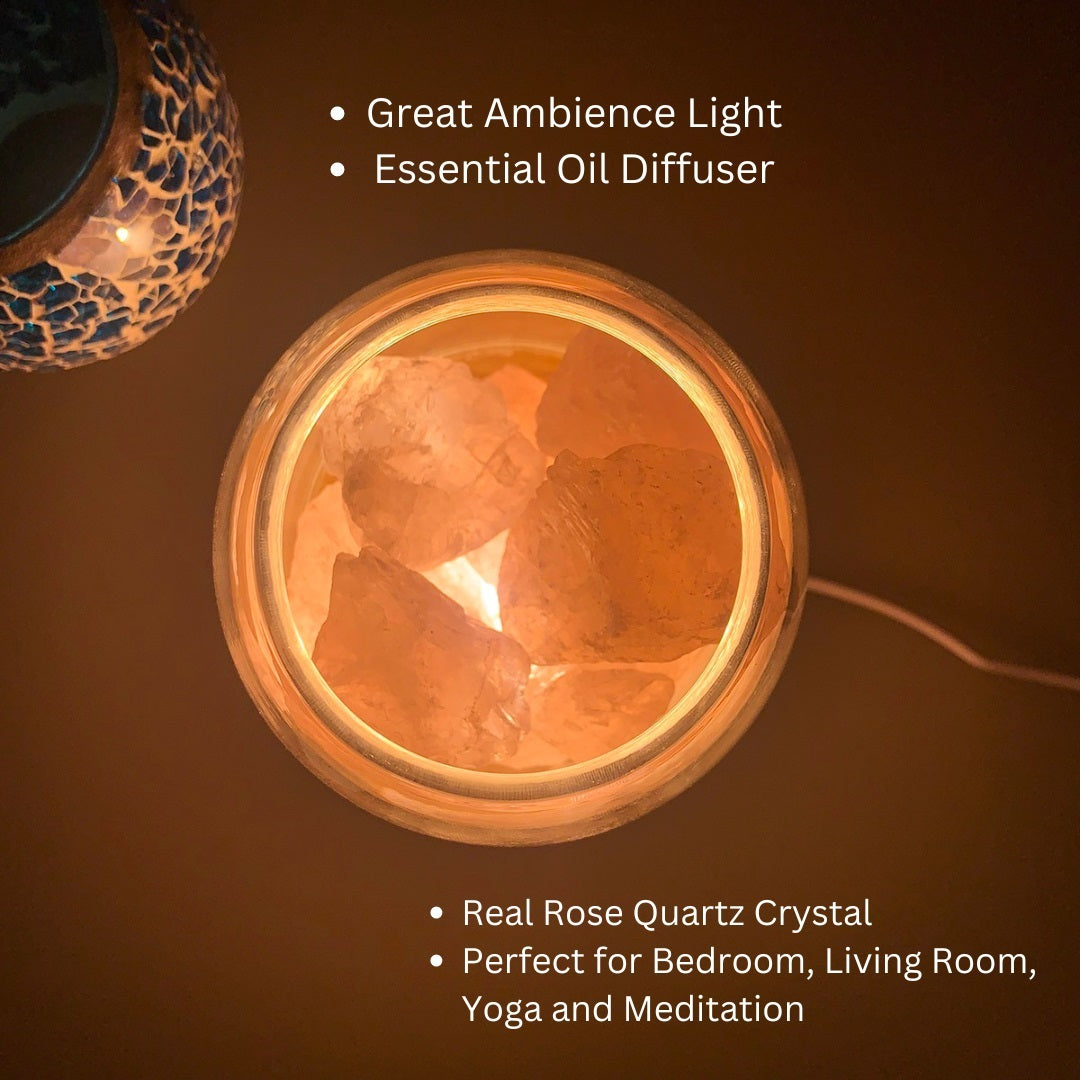 Glass diffuser with rose quartz crystals and text highlighting its use and benefits.