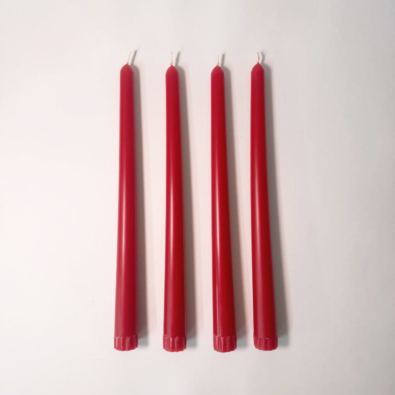 Five red candles on a white background