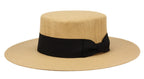 Beige straw hat with a black band on a white background